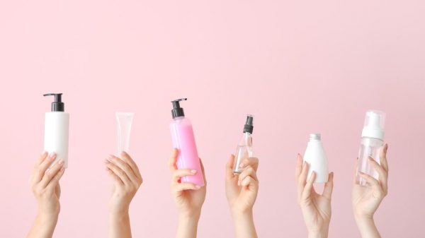 Spray bottles being held
