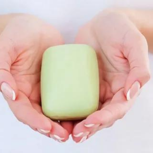 Bar of Soap In Womans Hand